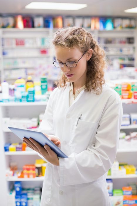 pharmacist-using-tablet-pc-at-the-hospital-pharmacy.jpg